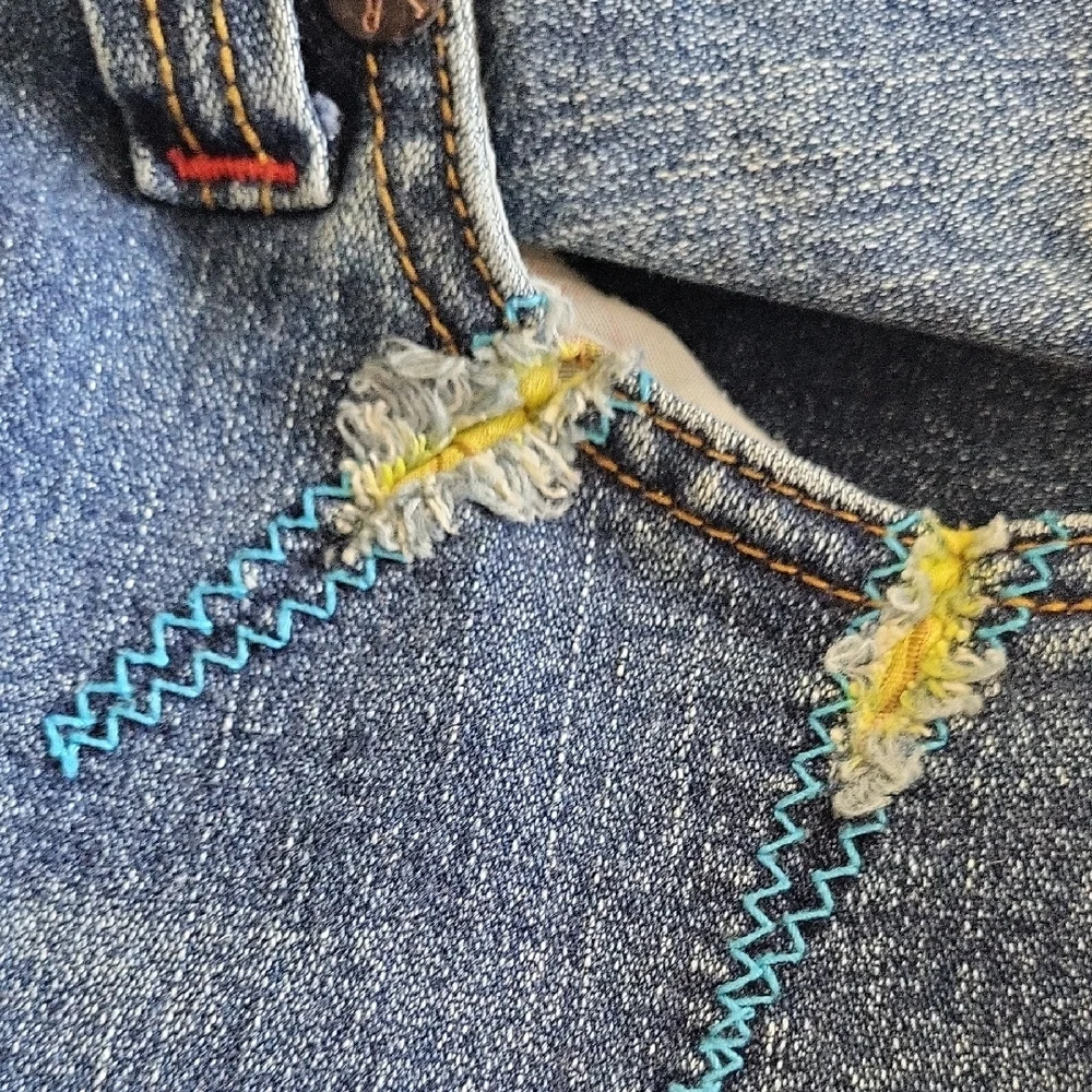 True Religion Denim Jeans With Yellow Accent Pocket. Row 29 Seat 34